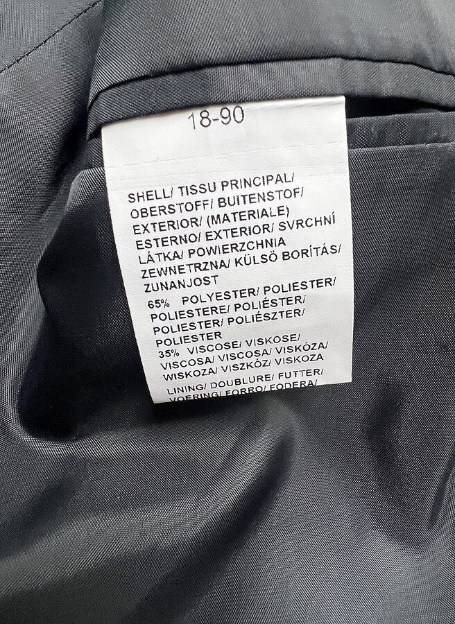 Waschetikett mit Materialangabe